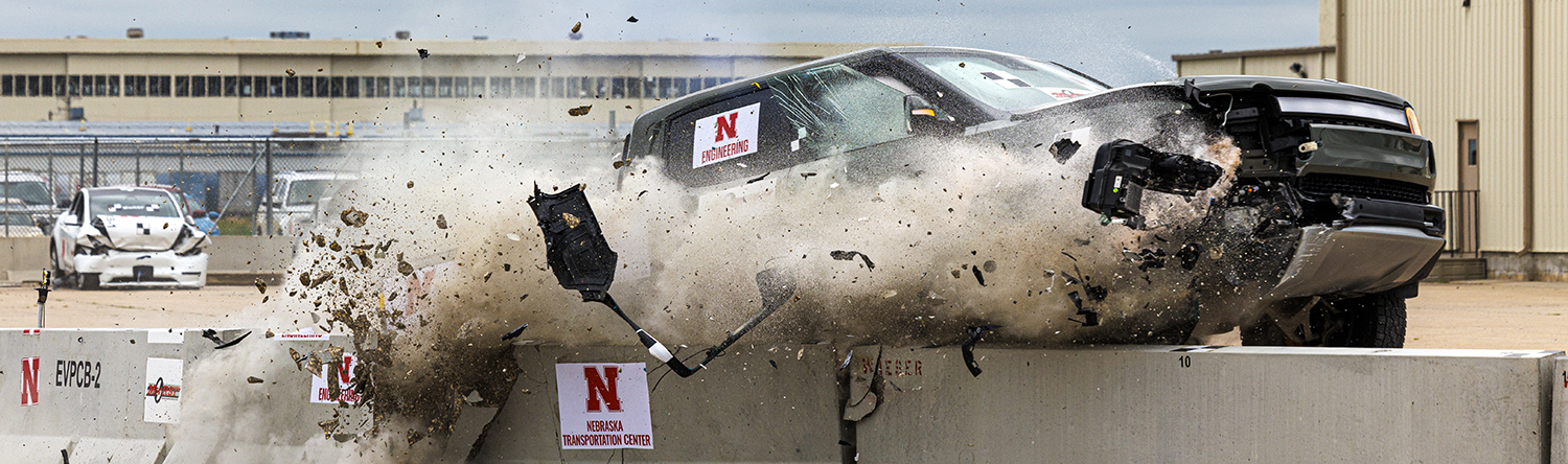 Crash test of a Rivian truck and a concrete barrier