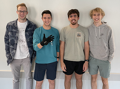 HANDY team poses with their project