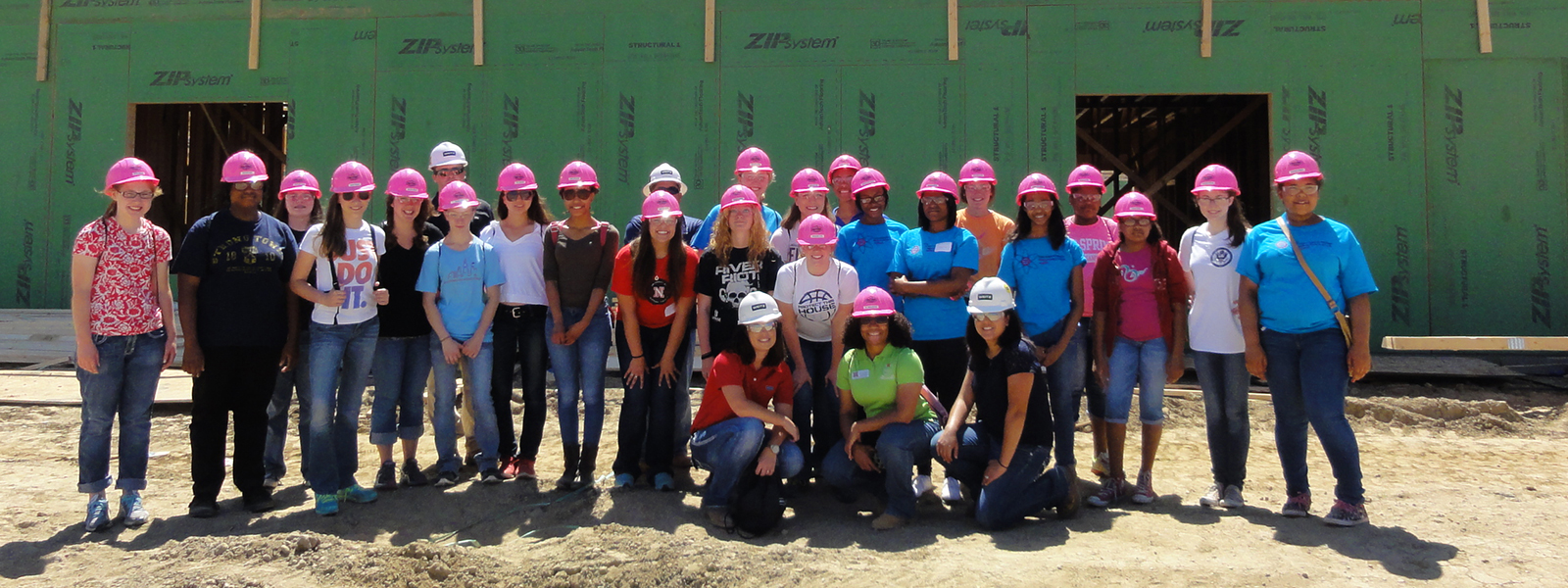 Durham School Pink Hardhat Program - Students lining up for a photo