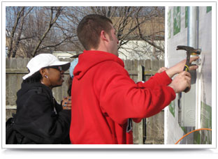 A UNL construction management student helps renovate facilities for neighbors in need.