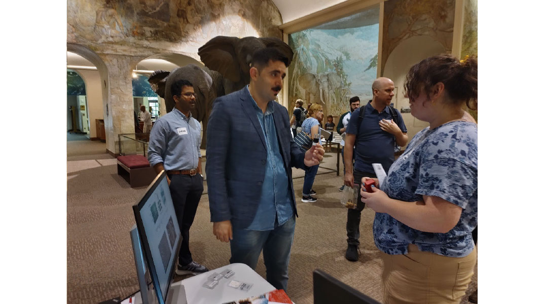 Sahand and Sarang speaking to event participants.